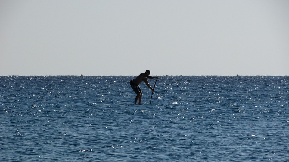 man paddling